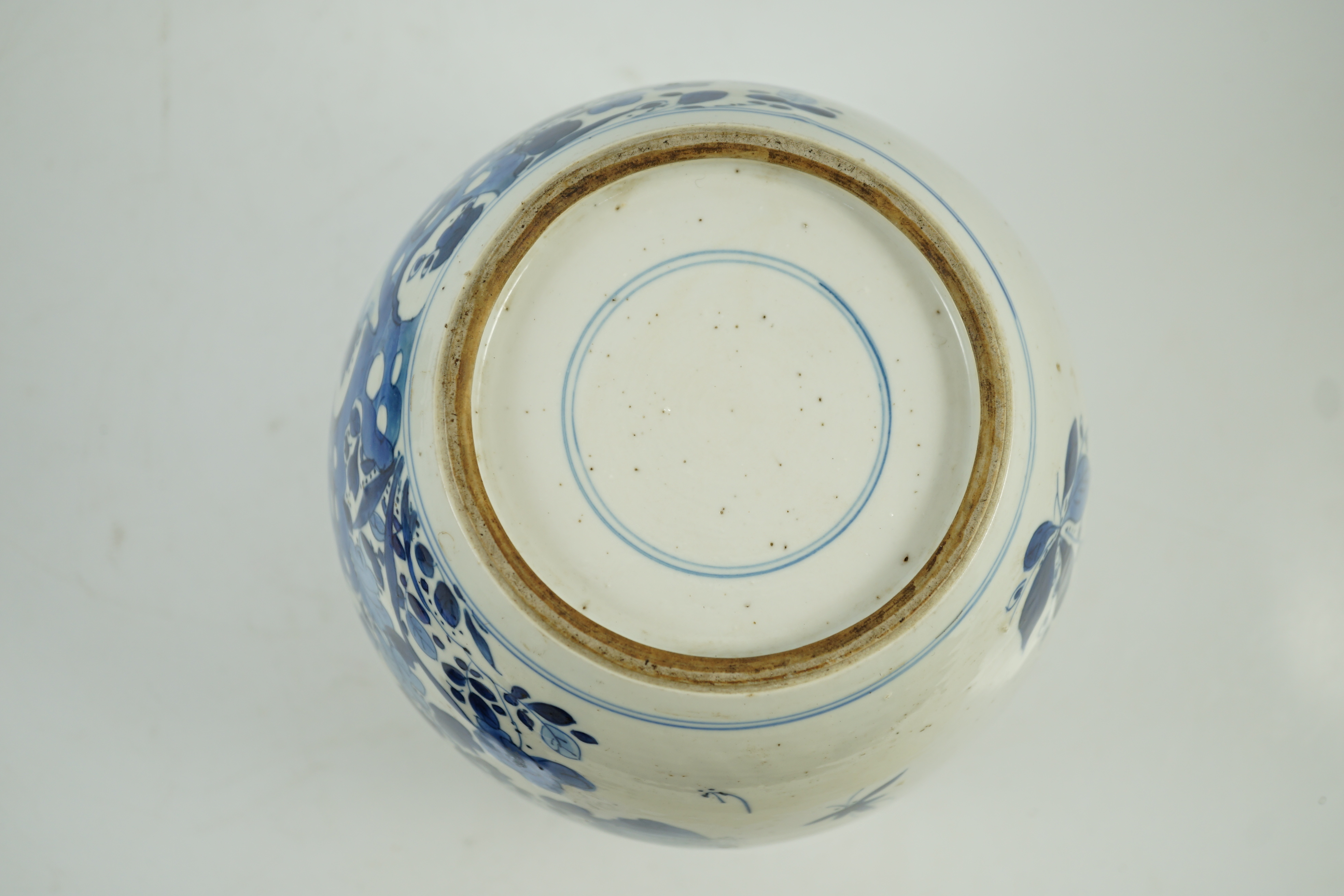 A Chinese blue and white ‘birds and rockwork’ ovoid jar, Kangxi period